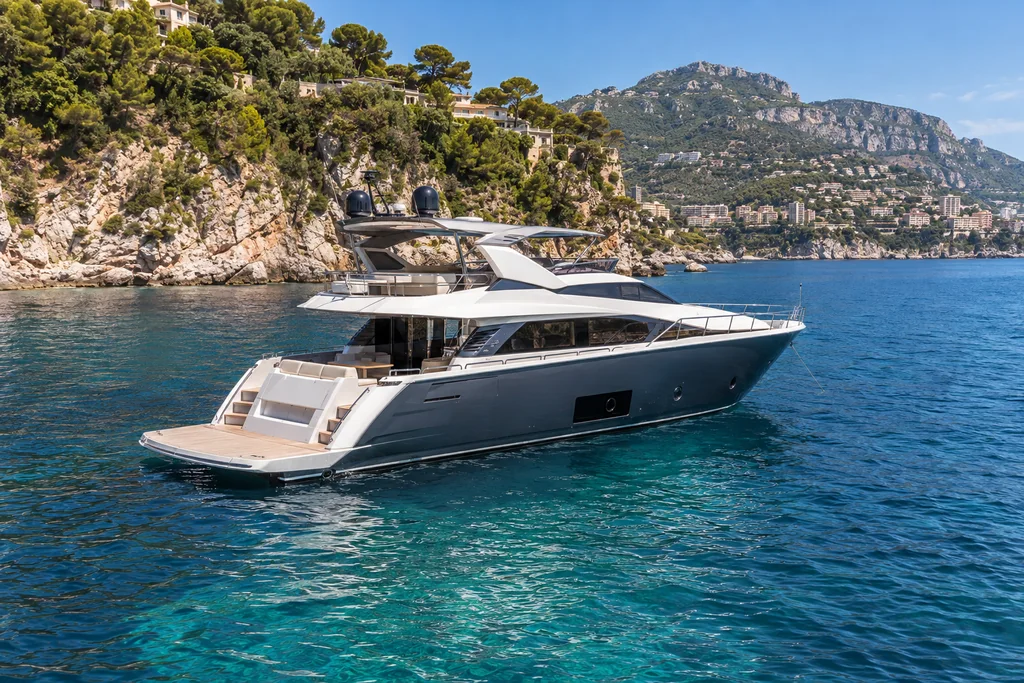 Motor yacht in a sheltered bay near Monaco